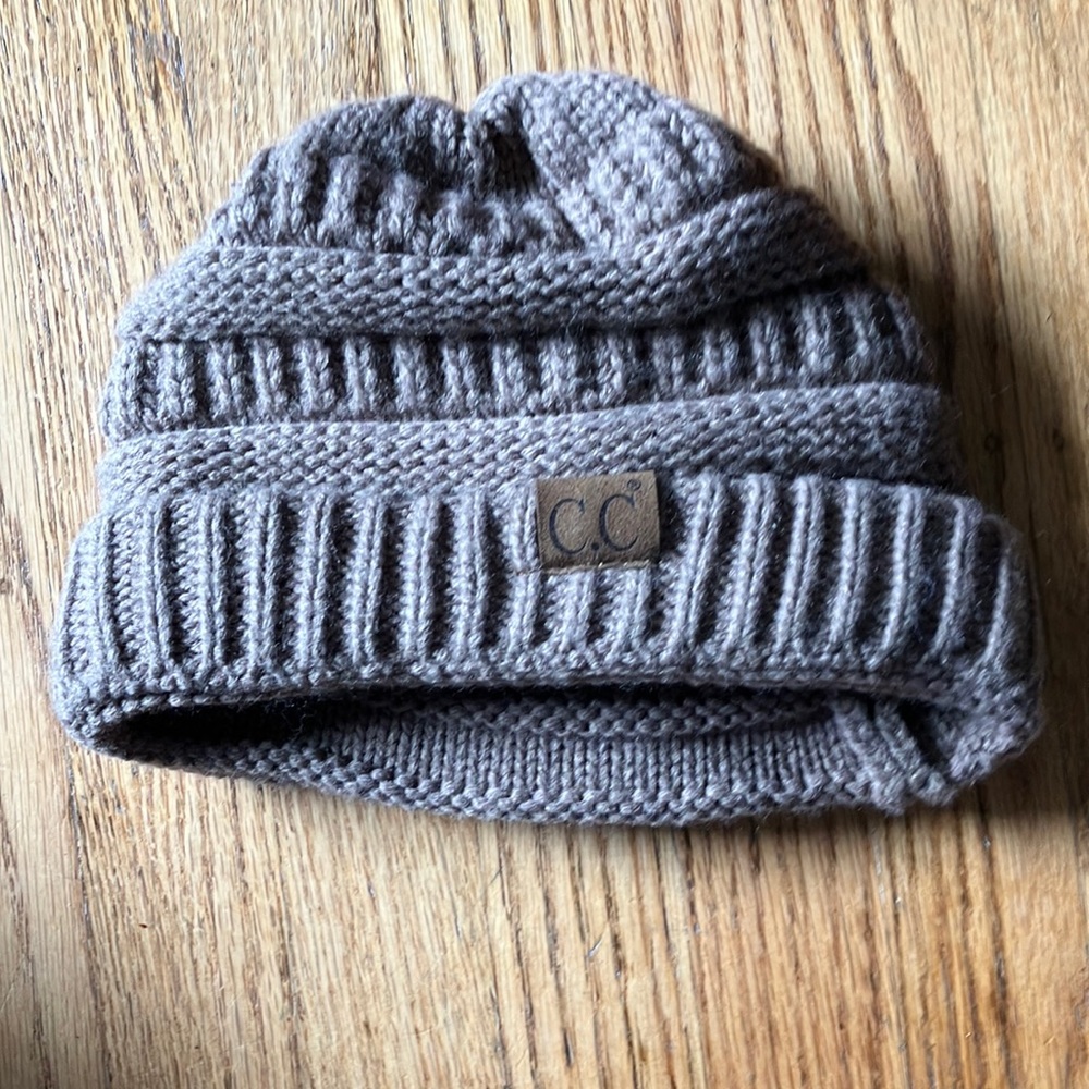 Light brownish grey beanie. C.C brand size small